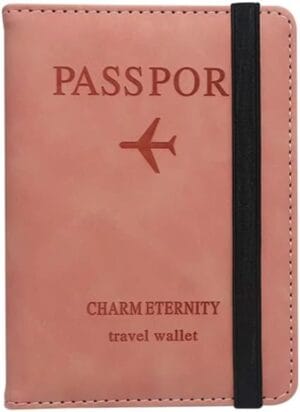 porta passaporte de viagem rosa salmão com compartimentos para cartões e documentos
